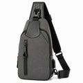 Borsa a tracolla 31x18x8 cm in materiale sintetico grigio scuro e nero con tasche zip per uso urbano